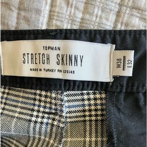 Top man Stretch skinny men’s slacks in black and white.
